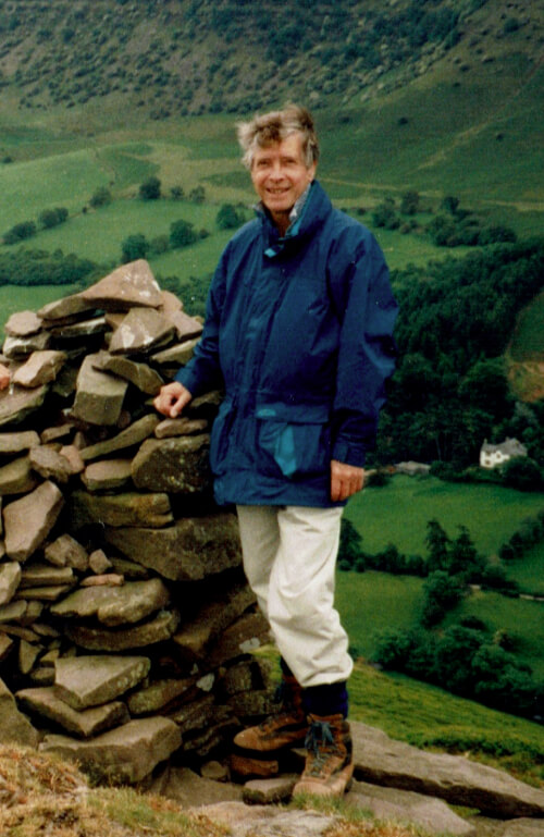 John Black standing on a hillside